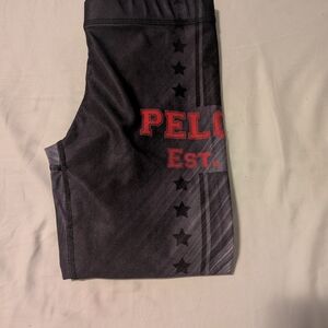 Black Athletic Leggings with Red 'PELOTON' Graphic